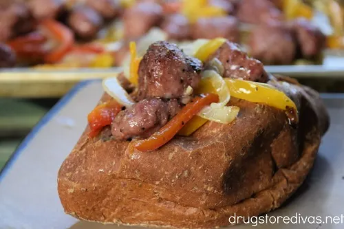 Sausage and peppers served in a roll.