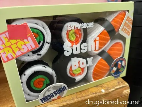 A box filled with sushi socks.