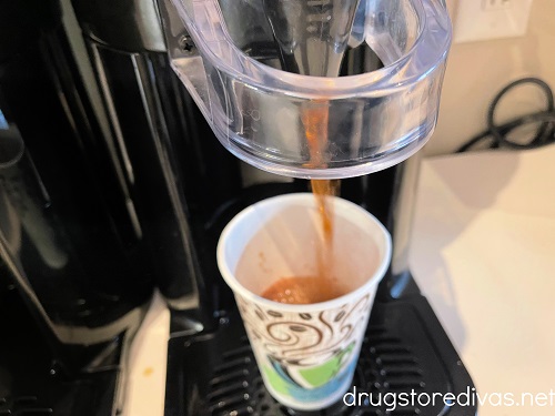 Coffee pouring into a hot cup.