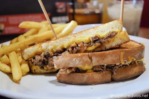 Brisket Stuffed Grilled Cheese with fries.