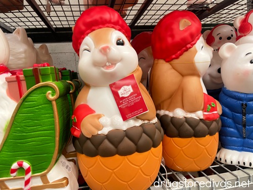 A Christmas decoration that's a squirrel in an acorn-shaped bathtub.