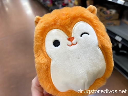 A stuffed animal shaped like a squirrel.