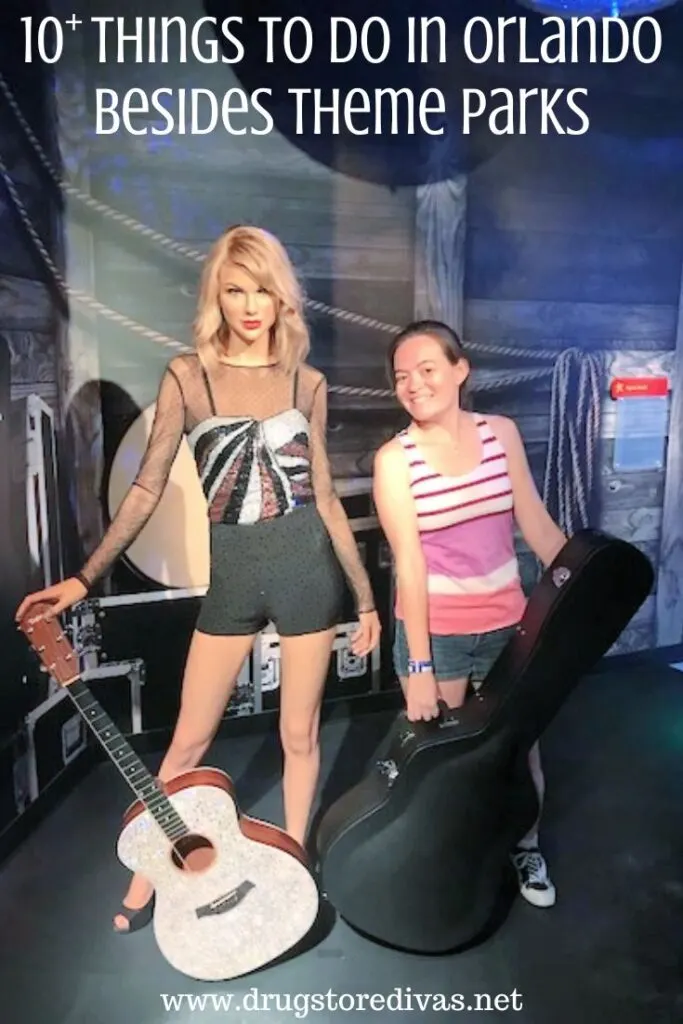 A woman standing with a wax figure of Taylor Swift with the words "10+ Things To Do In Orlando Besides Theme Parks" digitally written on top.