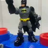 Batman action figure with the words 