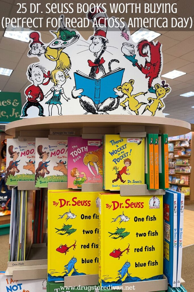 A display of Dr Seuss books in a bookstore with a cut out of characters from the Dr Seuss universe on top and the words "25 Dr Seuss Books Worth Buying (Perfect For Read Across America Day)" digitally written on top.