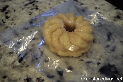 Donut in a plastic bag.