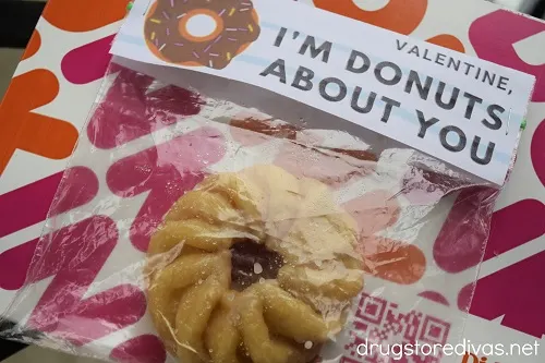Donut with a "Valentine, I'm Donuts About You" topper.