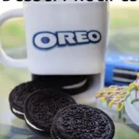 Oreo cookies coming out of a cookie mug that says 