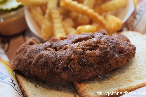A piece of Medium Chicken and fries from Dave's Hot Chicken.