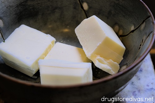 Vanilla almond bark squares in a bowl.