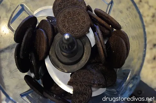 Oreo cookies in a food processor.