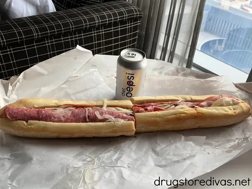 A gigantic sandwich from White House Subs in Atlantic City, NJ on a table next to a can of Diet Pepsi in a hotel room.