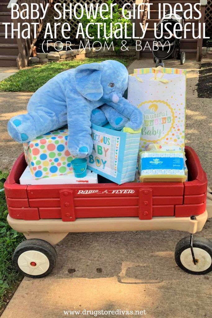 A radio flyer wagon with baby boy gifts, including a large blue stuffed animal, with the words "Baby Shower Gift Ideas That Are Actually Useful (For Mom & Baby)" digitally written on top.