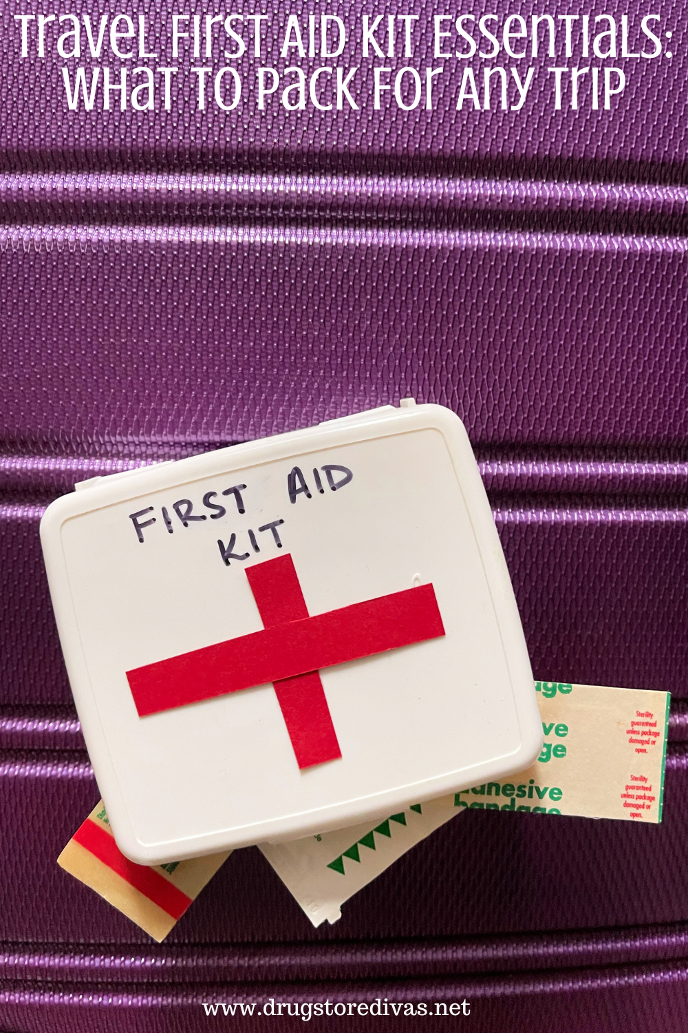 A travel first aid kit on a suitcase with the words 