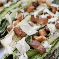 Grilled Salad on a tray with the words 