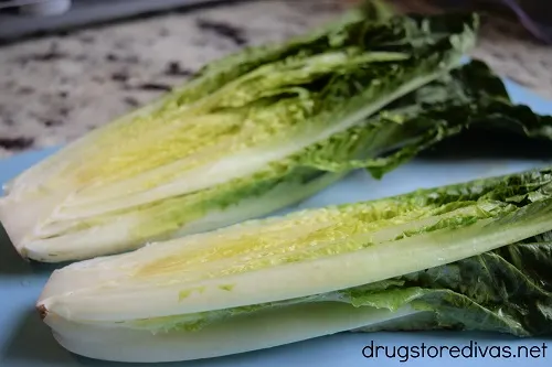 Romaine lettuce cut in half.