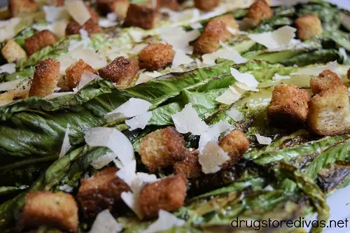 Romaine lettuce with croutons and cheese.