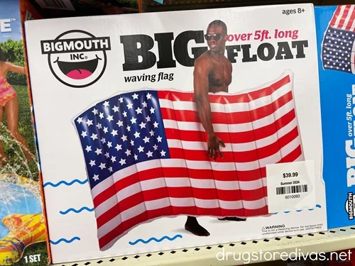 A box containing a pool float that's shaped like an American flag.