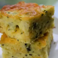 Two pieces of cornbread with the words 