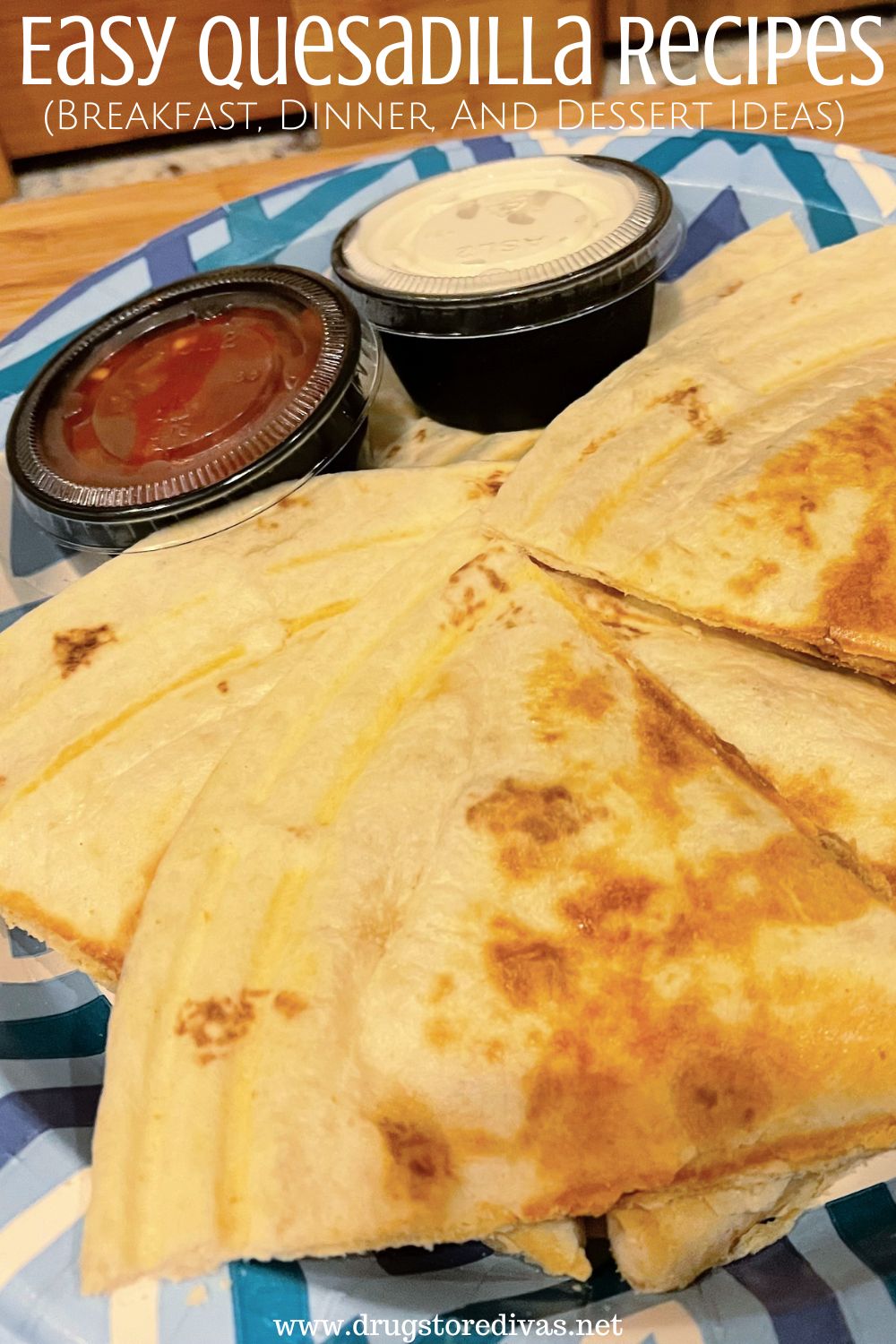 Quesadillas on a plate with sour cream and salsa and the words 