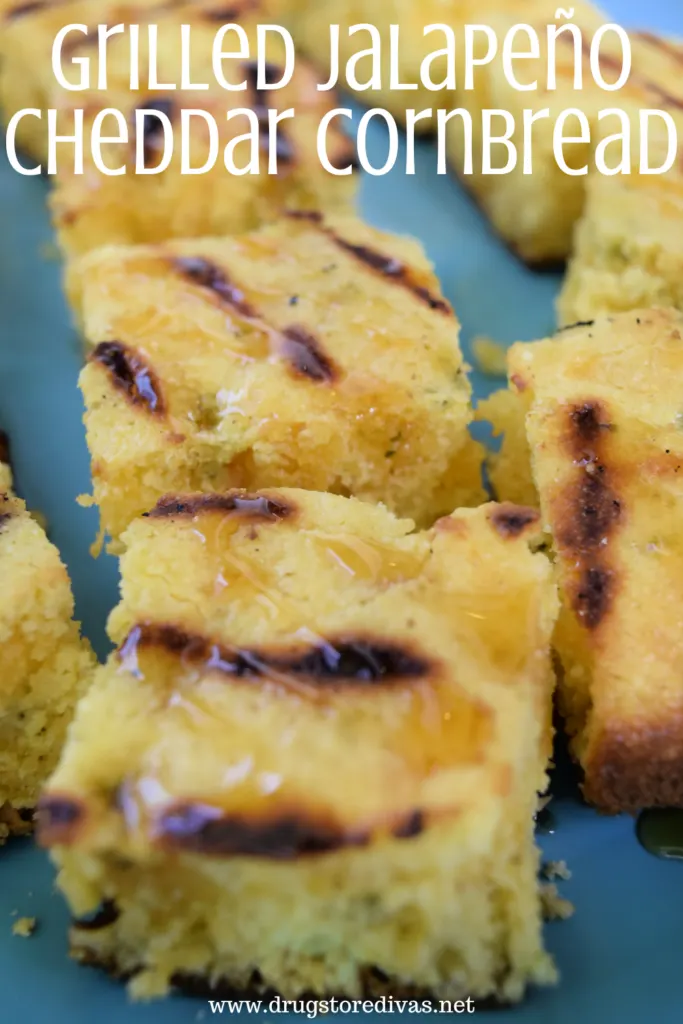 Pieces of cornbread on a plate with the words "Grilled Jalapeno Cheddar Cornbread" digitally written on top.