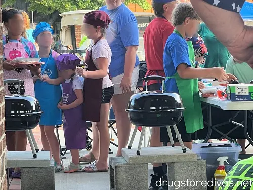 Kids competing in a barbecue contest at the South Carolina Festival Of Discovery.