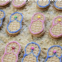 Flip Flop cookies on graham cracker sand with the words 