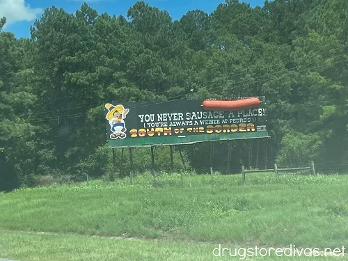 A road sign advertising South of the Border, SC.