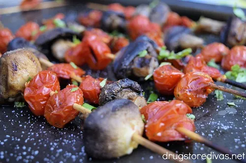 Grilled tomato and mushroom skewers.