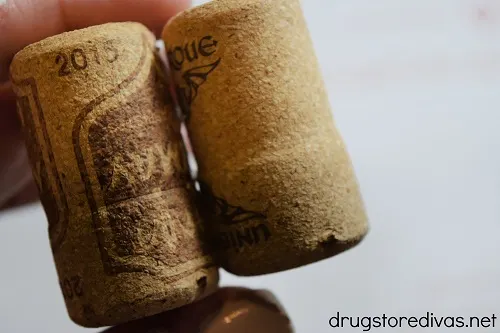 Two wine corks stuck together.