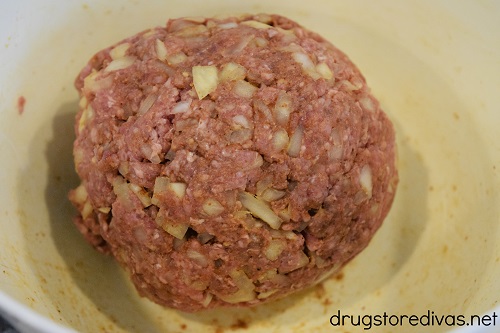 A ball of meat and onions.