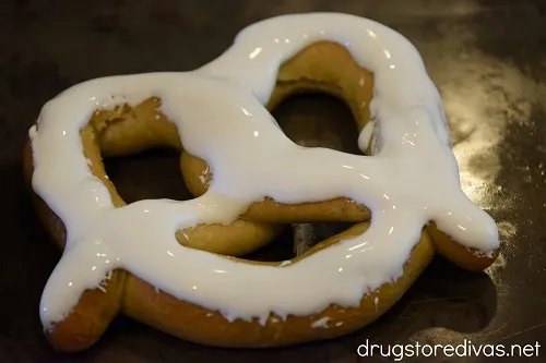 A soft pretzel covered in marshmallow creme.