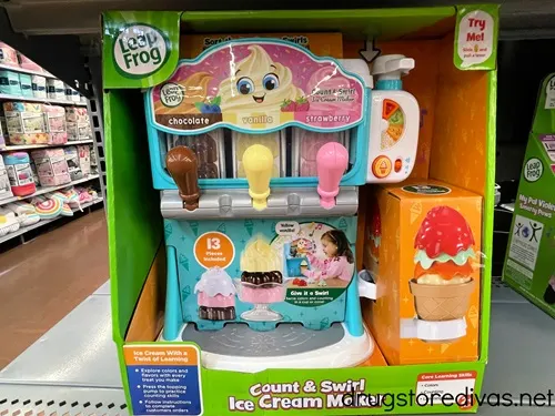 A LeapFrog Scoop and Learn Ice Cream Cart box on a shelf.
