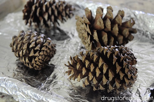 Pine cones on a foil lined cookie sheet.
