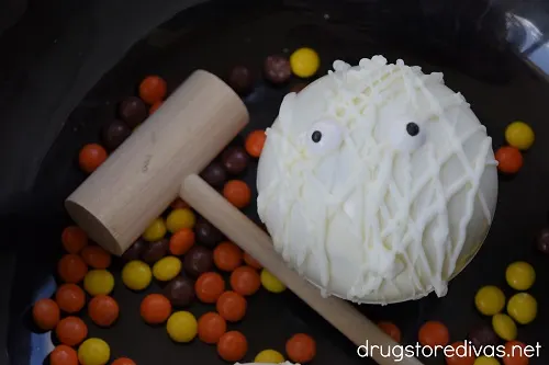 A Halloween Chocolate Breakable Mummy with a wooden hammer.