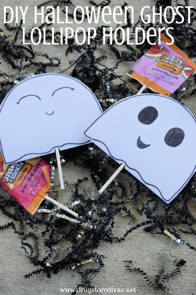 Two card stock ghosts on top of lollipops with two lollipops and paper shred with the words "DIY Halloween Ghost Lollipop Holders" digitally written on top.