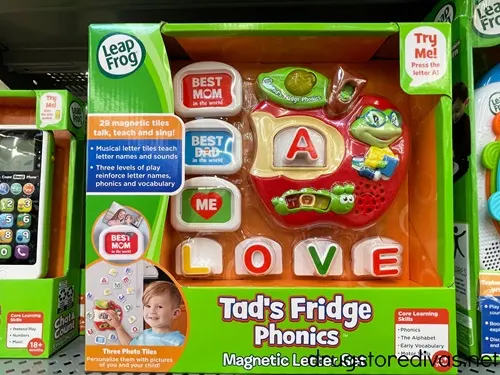 A box with a LeapFrog tad's fridge phonics magnetic letter set on a shelf.