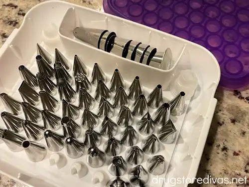 A piping tip set that's opened to see all the different metal tips.