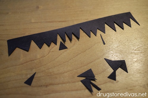 A strip of black paper cut to look like Frankenstein's hair.