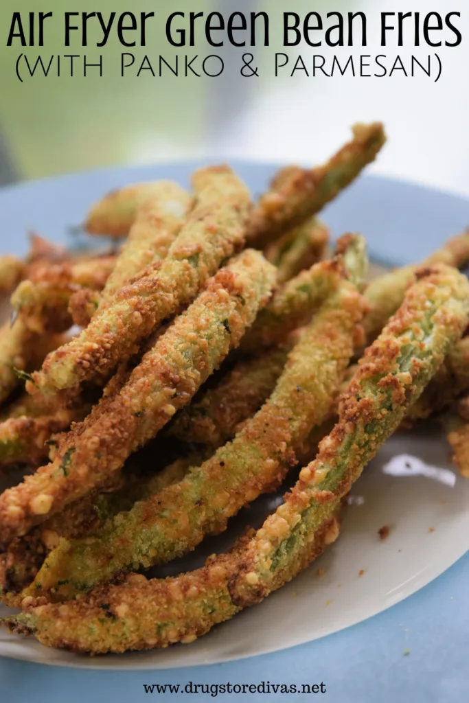 Green bean fries on a plate with the words "Air Fryer Green Bean Fries (with panko and parmesan)" digitally written on top.