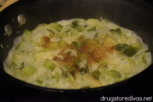 Vegetarian Brussels sprouts casserole ingredients in a pot.