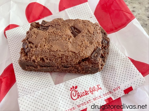 A brownie on top of a Chick-fil-A bag.