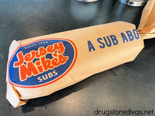 A sandwich wrapped in a Jersey Mike's bag.