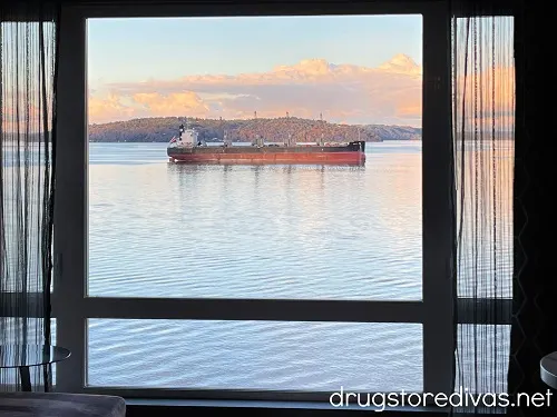 A window looking out at a boat in the Port of Tacoma.