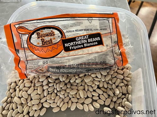 Beans in a plastic container.