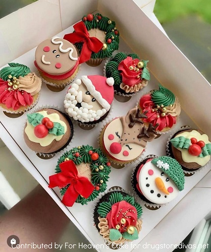 Twelve holiday cupcakes (decorated as Santa, reindeer, snowmen, wreaths, and more) from From Heaven's Cake in Union Gap, WA.