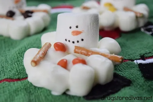 Three Melted Snowman Marshmallow Treats.