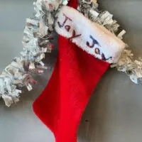 A Christmas stocking that says 
