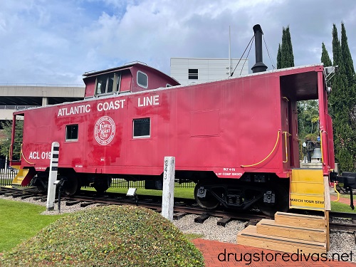 A red caboose at the Wilmington Railroad Museum in Wilmington, NC.