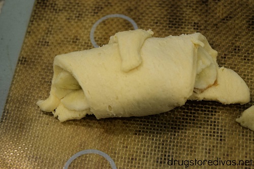 An uncooked crescent roll.